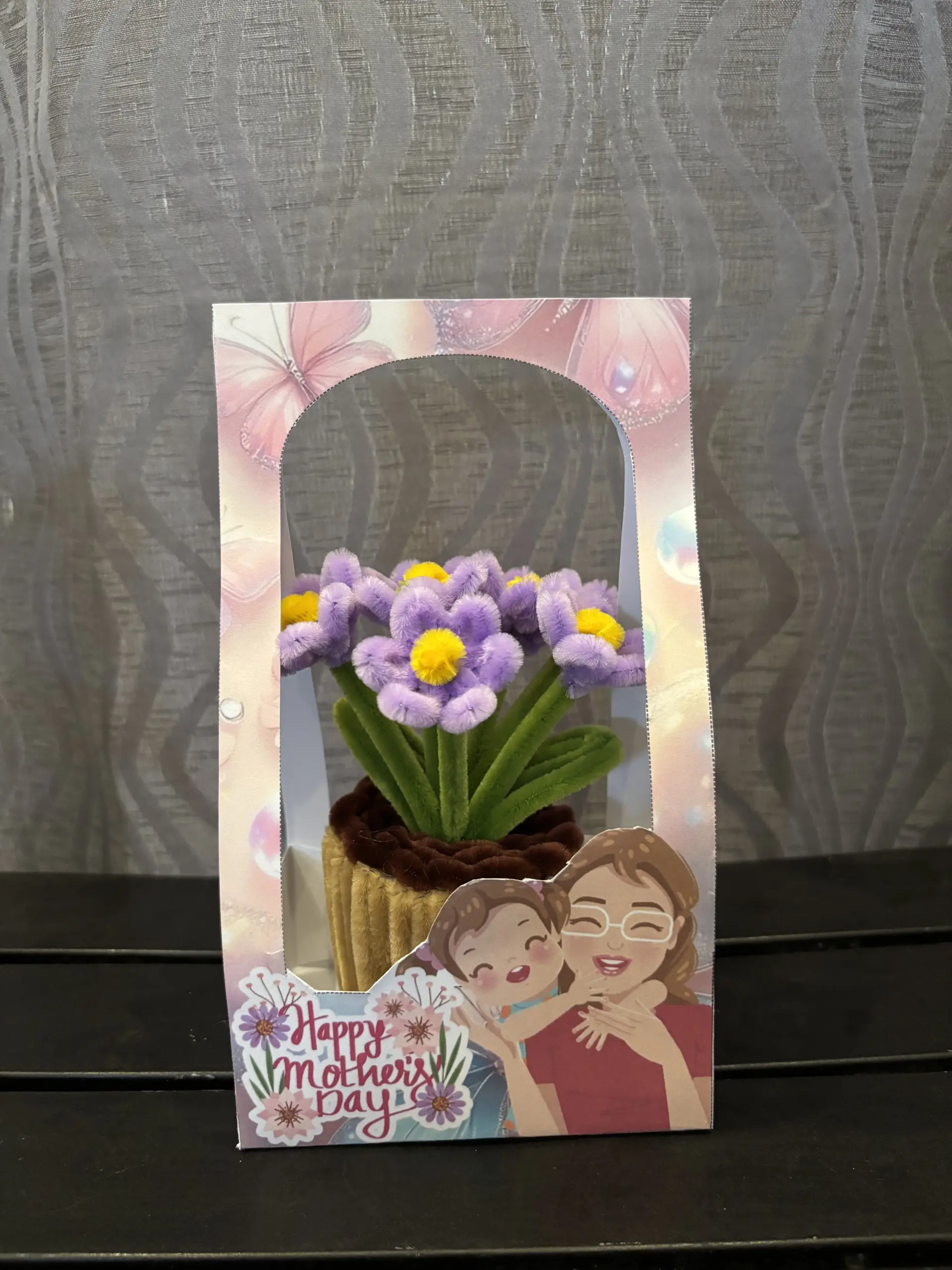 FleurKraft mini pot mauve — lavender-toned fuzzy wire flower showing petal detail and basket pot construction